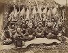 Семья айнов. Крашенная вручную японская альбуминовая фотография эпохи Мэйдзи (1868-1912). 